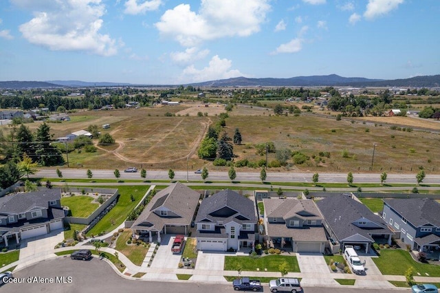 1839 N Skagit Dr, Post Falls, ID 83854 - aerial perspective of suburban area featuring a mountain backdrop