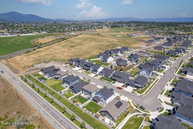 1839 N Skagit Dr, Post Falls, ID 83854 - aerial view of property and surrounding area featuring a mountainous background and nearby suburban area