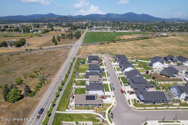 1839 N Skagit Dr, Post Falls, ID 83854 - aerial overview of property's location featuring a mountainous background and nearby suburban area