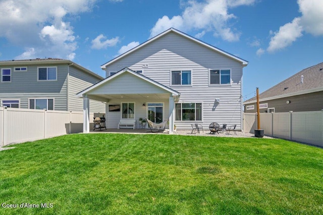 1839 N Skagit Dr, Post Falls, ID 83854 - rear view of house featuring a patio and a fenced backyard