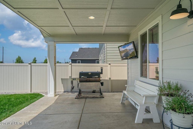 1839 N Skagit Dr, Post Falls, ID 83854 - view of patio / terrace with grilling area and a ceiling fan