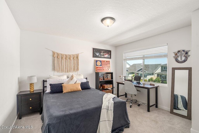 1839 N Skagit Dr, Post Falls, ID 83854 - carpeted bedroom with a desk and baseboards