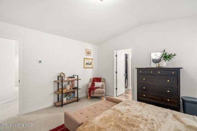 1839 N Skagit Dr, Post Falls, ID 83854 - carpeted bedroom featuring lofted ceiling and baseboards