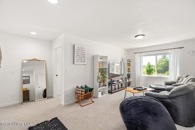 1839 N Skagit Dr, Post Falls, ID 83854 - living room with carpet floors, a textured ceiling, and recessed lighting