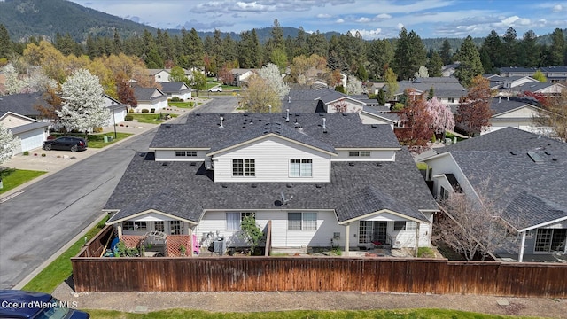 3789 N Steven Pl, Coeur Dalene, ID 83815 - back of property featuring roof with shingles and a residential view