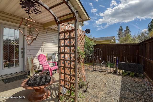 3789 N Steven Pl, Coeur Dalene, ID 83815 - view of patio / terrace with a fire pit and ceiling fan