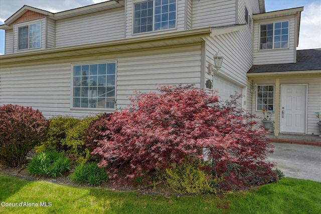 3789 N Steven Pl, Coeur Dalene, ID 83815 - view of property exterior with an attached garage
