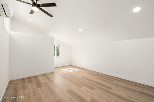 28729 Ramsey Rd, Athol, ID 83801 - bonus room featuring an AC wall unit, a ceiling fan, lofted ceiling, recessed lighting, and light wood-style flooring