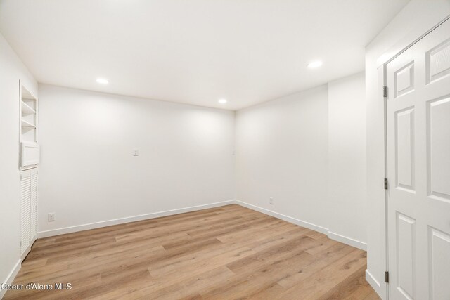 28729 Ramsey Rd, Athol, ID 83801 - unfurnished room with recessed lighting and light wood-style flooring