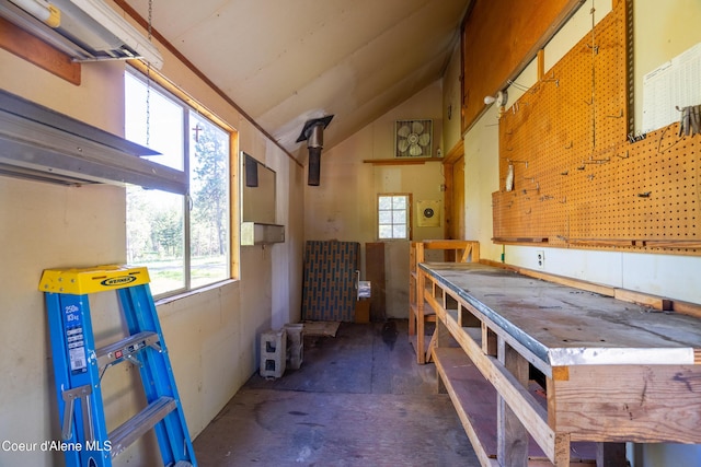 28729 Ramsey Rd, Athol, ID 83801 - misc room featuring a workshop area, lofted ceiling, and unfinished concrete flooring