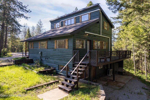 28729 Ramsey Rd, Athol, ID 83801 - view of front of home with a deck and stairs