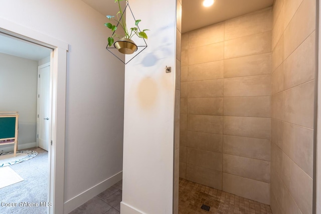 3304 N Rosalia Rd, Coeur Dalene, ID 83814 - bathroom featuring tiled shower and baseboards