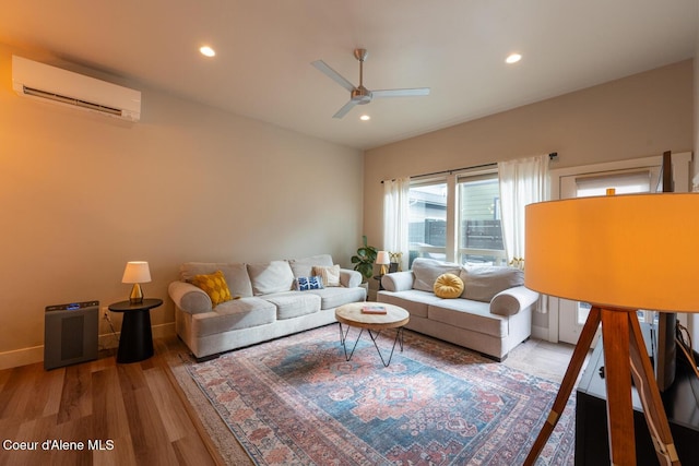 3304 N Rosalia Rd, Coeur Dalene, ID 83814 - living area featuring a wall unit AC, wood finished floors, a ceiling fan, and recessed lighting