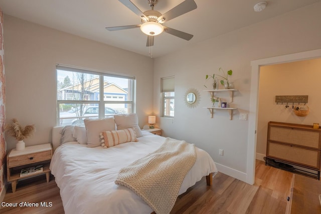 3304 N Rosalia Rd, Coeur Dalene, ID 83814 - bedroom featuring wood finished floors and a ceiling fan