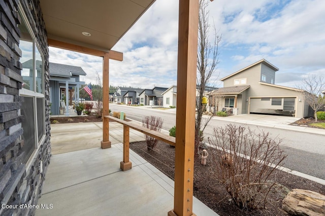 3304 N Rosalia Rd, Coeur Dalene, ID 83814 - porch featuring a residential view