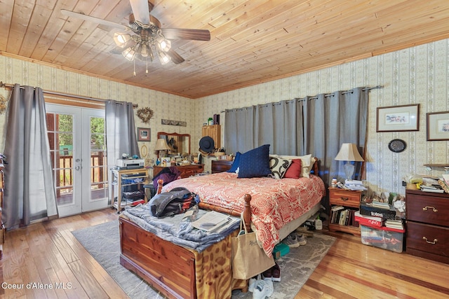 784 Twin Rivers Rd, Athol, ID 83801 - bedroom featuring wallpapered walls, access to outside, hardwood / wood-style floors, french doors, and crown molding