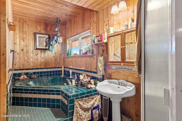 784 Twin Rivers Rd, Athol, ID 83801 - bathroom with wooden walls, a garden tub, and wooden ceiling