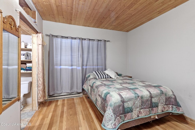 784 Twin Rivers Rd, Athol, ID 83801 - bedroom with wood finished floors and wooden ceiling