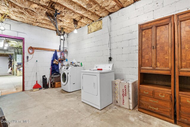 784 Twin Rivers Rd, Athol, ID 83801 - laundry room featuring washer and clothes dryer and concrete block wall