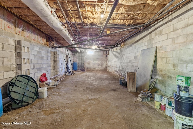 784 Twin Rivers Rd, Athol, ID 83801 - unfinished basement featuring a water pressure tank