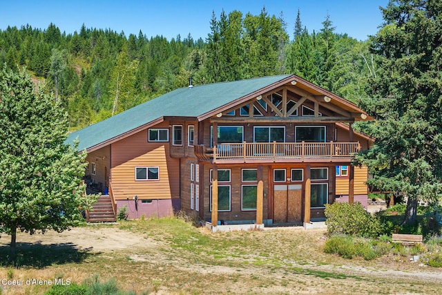 784 Twin Rivers Rd, Athol, ID 83801 - back of property featuring a view of trees