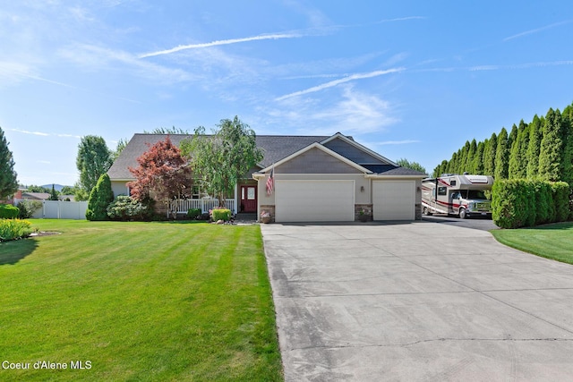 2042 W Heavenly Star Ct, Post Falls, ID 83854 - view of front of house featuring an attached garage and concrete driveway