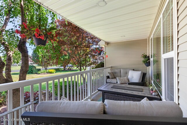 2042 W Heavenly Star Ct, Post Falls, ID 83854 - porch with outdoor lounge area