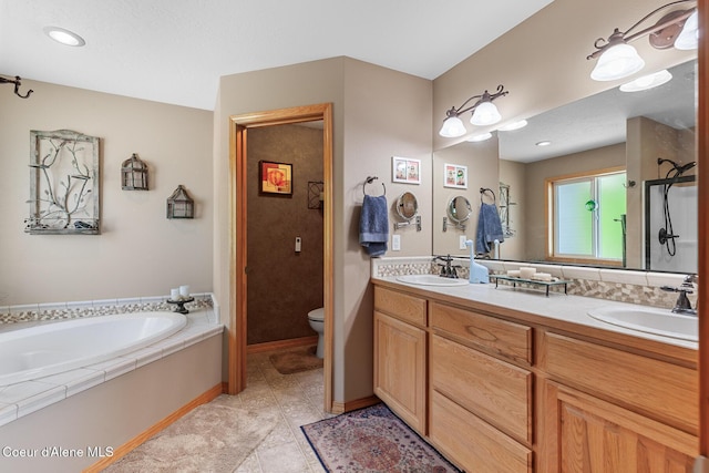 2042 W Heavenly Star Ct, Post Falls, ID 83854 - full bath featuring double vanity, a garden tub, tile patterned flooring, and recessed lighting