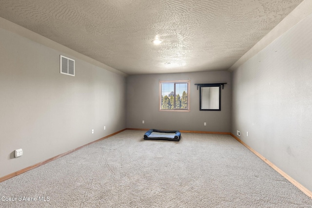 2042 W Heavenly Star Ct, Post Falls, ID 83854 - empty room featuring carpet and a textured ceiling