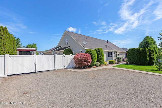 2042 W Heavenly Star Ct, Post Falls, ID 83854 - view of home's exterior featuring a gate