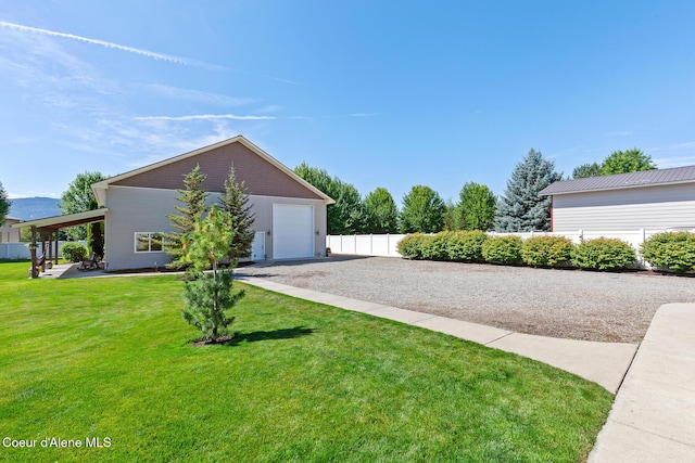 2042 W Heavenly Star Ct, Post Falls, ID 83854 - view of yard featuring driveway and a garage