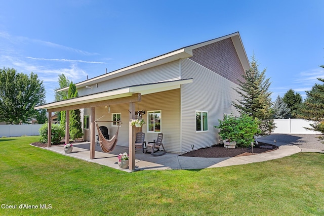 2042 W Heavenly Star Ct, Post Falls, ID 83854 - rear view of property with a patio area