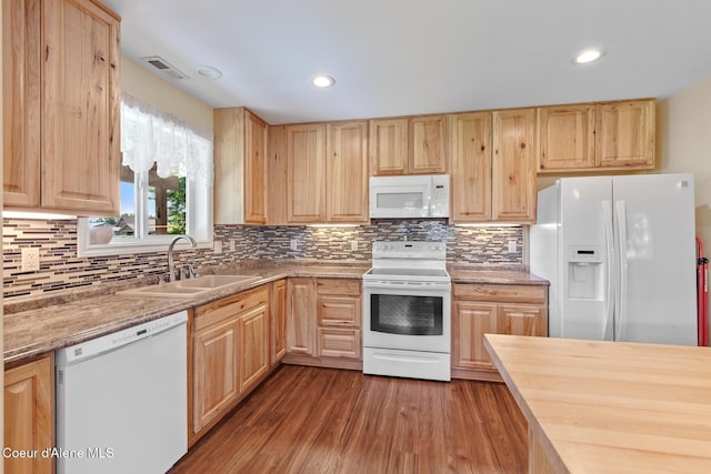 2042 W Heavenly Star Ct, Post Falls, ID 83854 - kitchen featuring white appliances, light brown cabinetry, dark wood-style floors, and recessed lighting