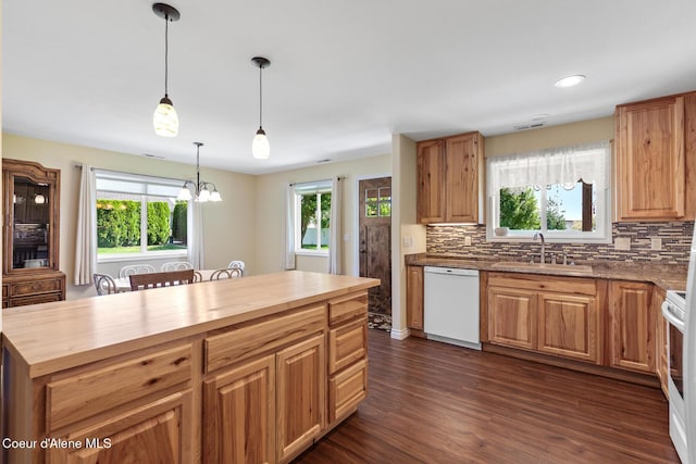 2042 W Heavenly Star Ct, Post Falls, ID 83854 - kitchen featuring white dishwasher, wood counters, decorative backsplash, and recessed lighting