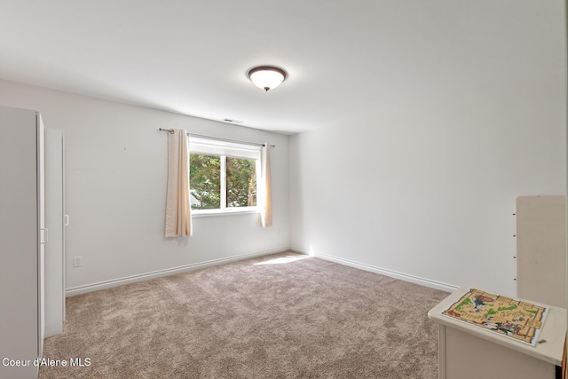 2042 W Heavenly Star Ct, Post Falls, ID 83854 - carpeted empty room with baseboards