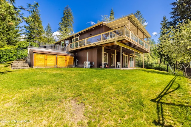 7485 E Revilo Point Rd, Hayden, ID 83835 - rear view of house featuring a wooden deck
