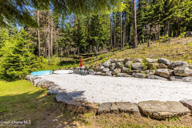 7485 E Revilo Point Rd, Hayden, ID 83835 - view of yard with a forest view