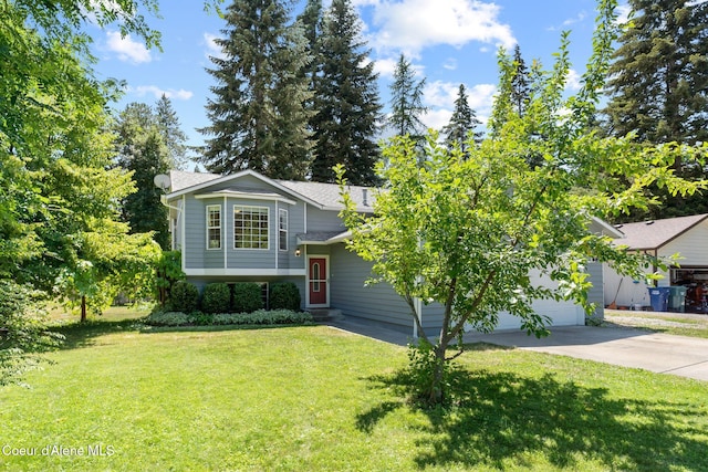 7386 W Sunrise Ct, Rathdrum, ID 83858 - view of front facade with concrete driveway, a front yard, an attached garage, and a shingled roof