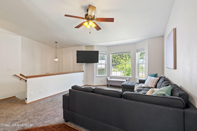7386 W Sunrise Ct, Rathdrum, ID 83858 - living area with a ceiling fan and dark carpet