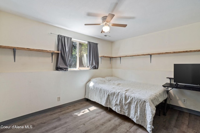 7386 W Sunrise Ct, Rathdrum, ID 83858 - bedroom with wood finished floors and a ceiling fan