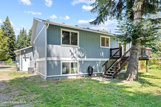 7386 W Sunrise Ct, Rathdrum, ID 83858 - rear view of property with a wooden deck and stairway