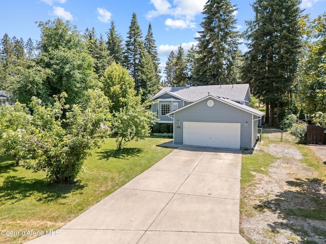 7386 W Sunrise Ct, Rathdrum, ID 83858 - view of front of home featuring a garage and concrete driveway