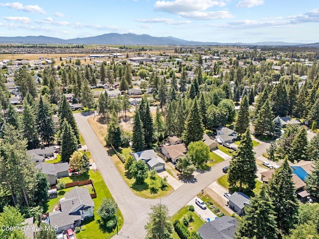 7386 W Sunrise Ct, Rathdrum, ID 83858 - aerial view of residential area featuring a mountainous background