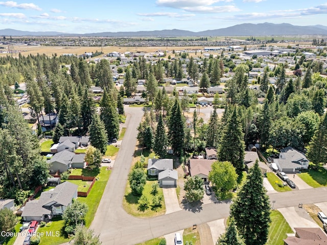 7386 W Sunrise Ct, Rathdrum, ID 83858 - view of property location with a mountain backdrop and nearby suburban area