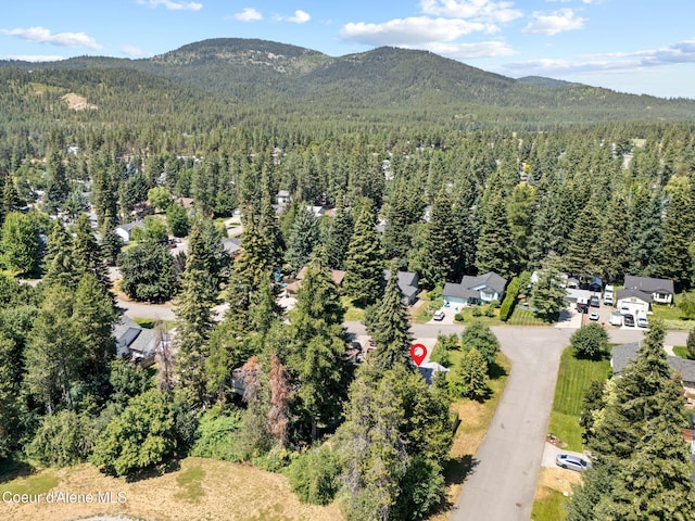 7386 W Sunrise Ct, Rathdrum, ID 83858 - bird's eye view of a heavily wooded area and a mountainous background