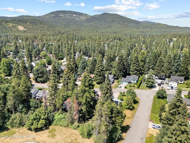 7386 W Sunrise Ct, Rathdrum, ID 83858 - aerial view of a heavily wooded area and mountains