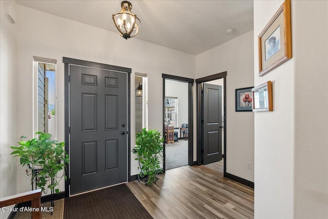 2636 N Wrenley Ln, Post Falls, ID 83854 - foyer featuring wood finished floors and baseboards