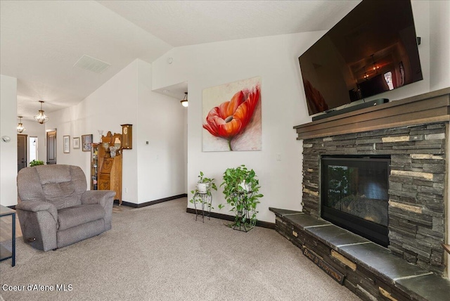 2636 N Wrenley Ln, Post Falls, ID 83854 - living area with lofted ceiling, carpet, and a fireplace