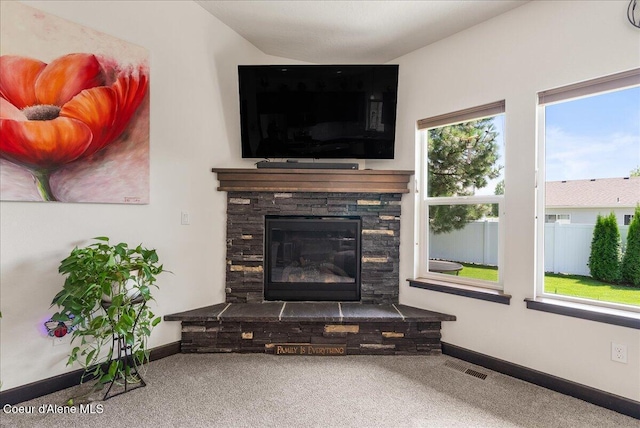 2636 N Wrenley Ln, Post Falls, ID 83854 - living room with carpet floors and a stone fireplace