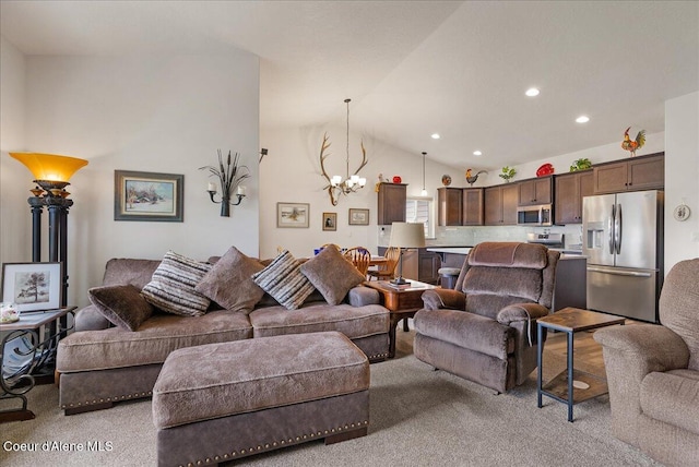 2636 N Wrenley Ln, Post Falls, ID 83854 - living room with a chandelier, light colored carpet, recessed lighting, and vaulted ceiling